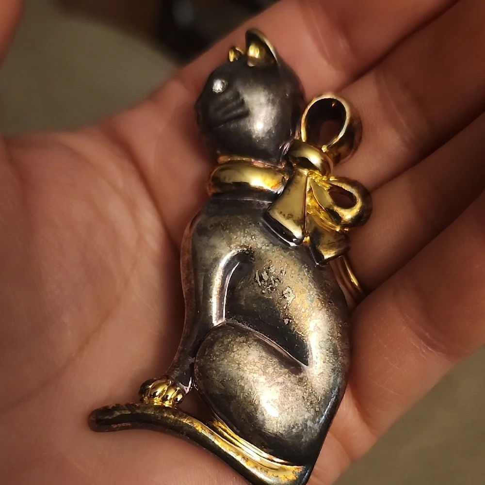 Charming Cat Pendant with Gold Accents